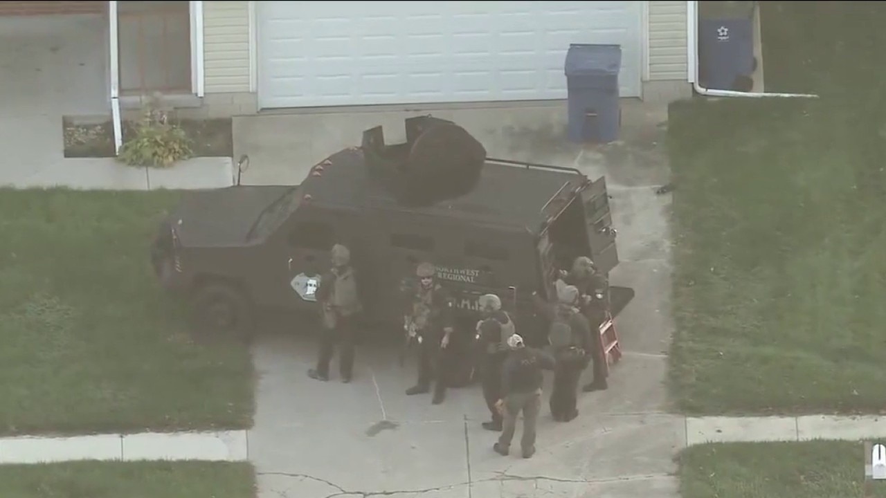 SWAT standoff ends in Lowell, Indiana as coroner responds to scene