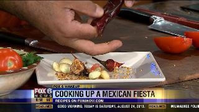 Chef prepares a mexican masterpiece