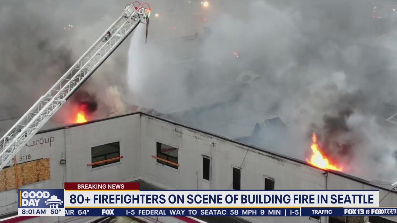 Building fire continues to burn in Seattle