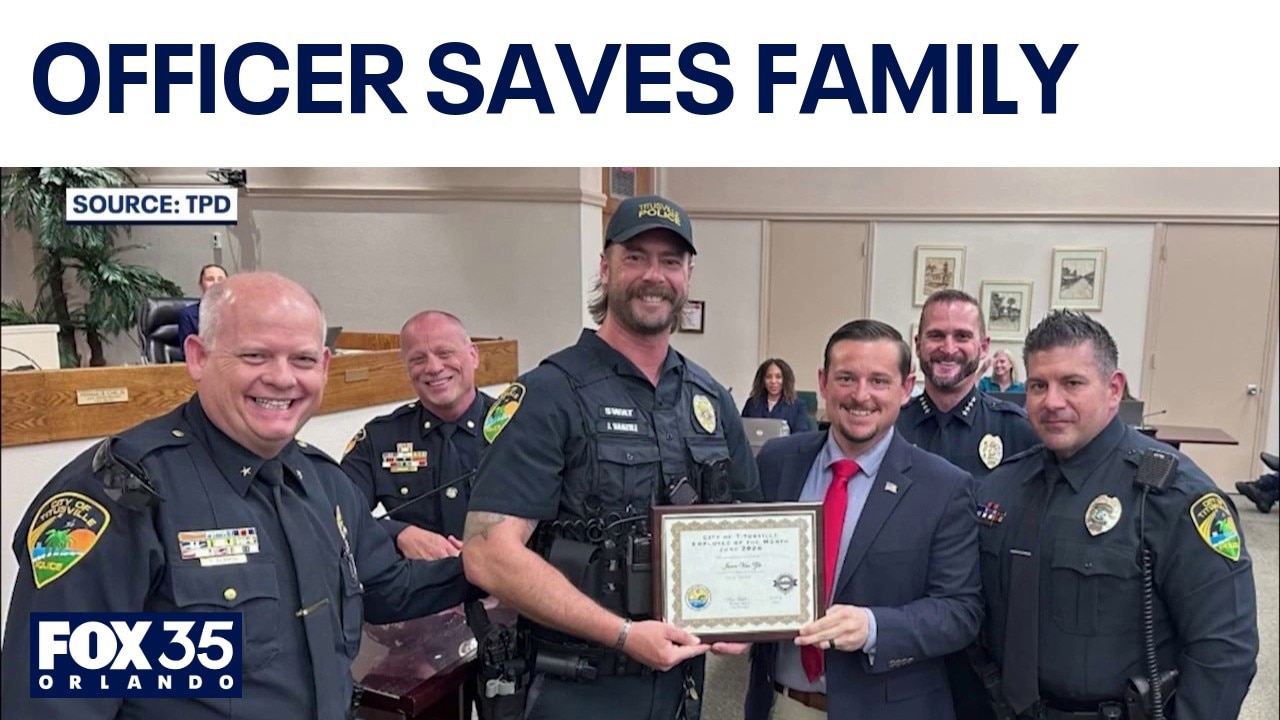 Titusville officer honored after rescuing family from water during storm
