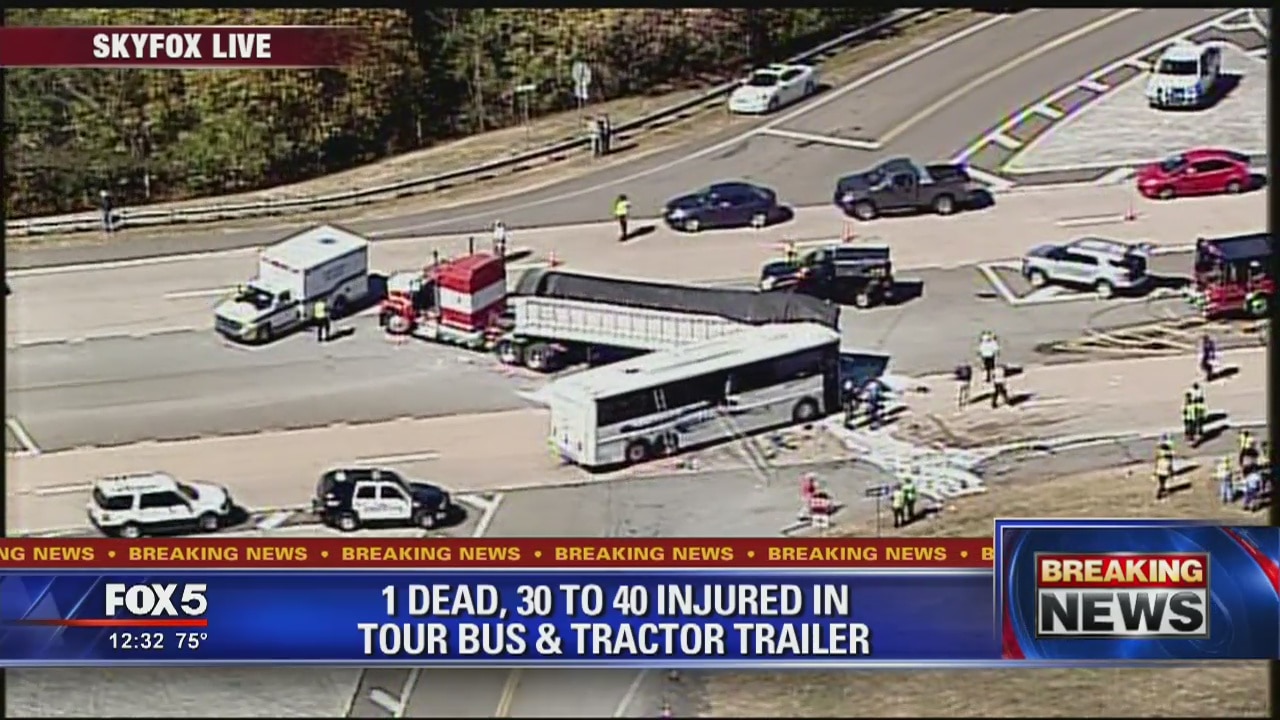 1 dead, dozens injured in tour bus crash