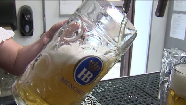 Laura learns how to pour beer