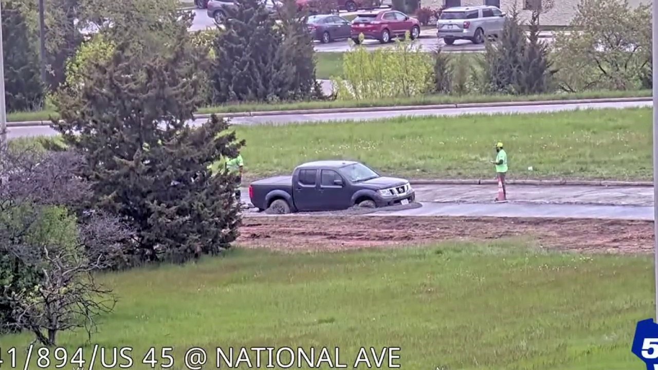 WI driver removes ‘road closed’ barrier; stuck in fresh concrete