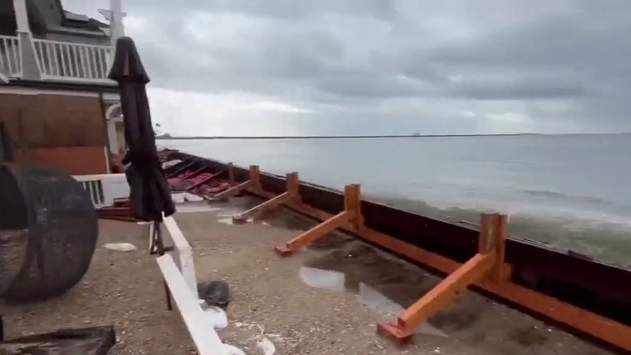 Long Beach coastline battered by strong surf 