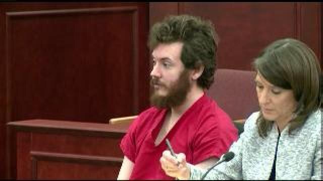 Holmes appears in court
