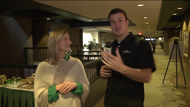 Chip learns about the gingerbread houses on display at Grand Geneva