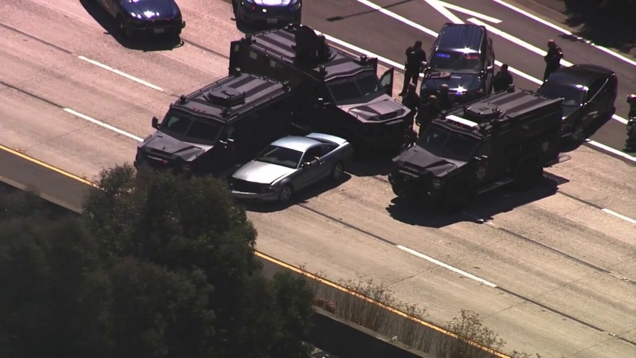 SWAT teams on I-580 in San Leandro at the 164th Avenue off-ramp