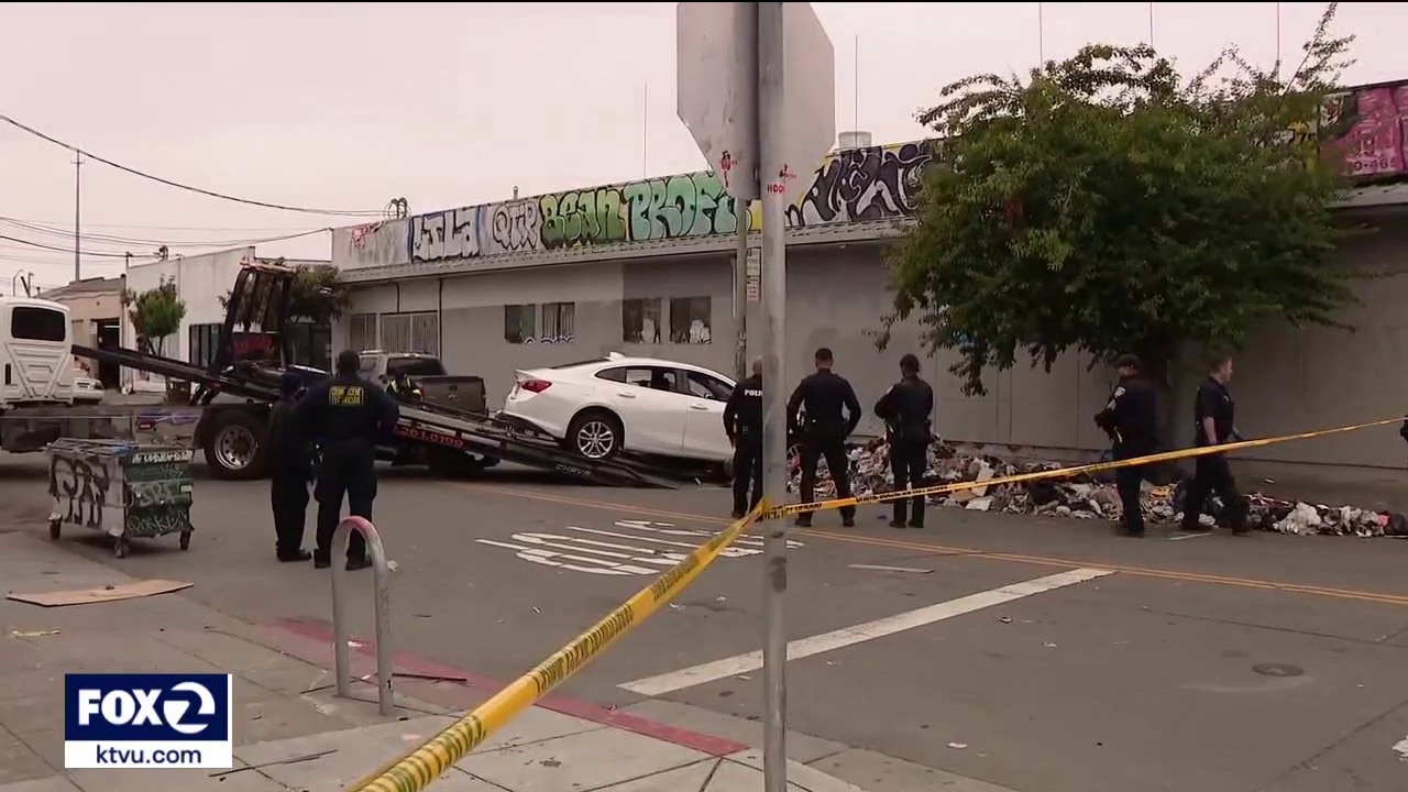 Oakland police shoot suspect after he drags officer in car, pins another