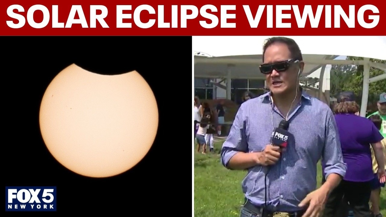 Kids see solar eclipse at Liberty Science Center