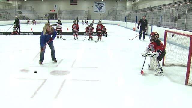 Laura learns about SHAW, puts her hockey skills to the test