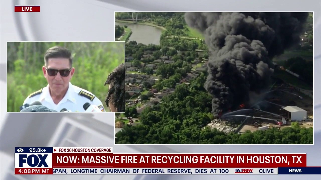 Crews battle massive fire at recycling facility in Houston