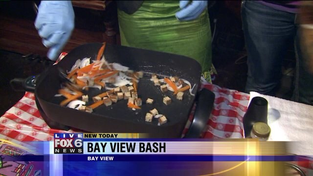 Laura checks out food at Bay View Bash