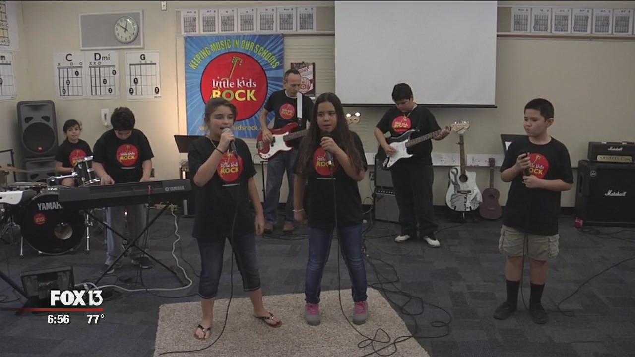 Gasparilla gives instruments to kids