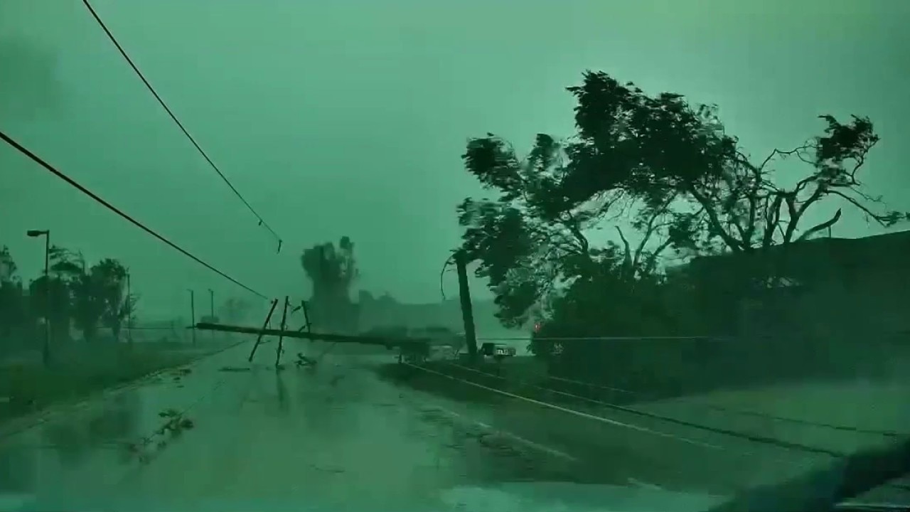 Car trapped by power lines during tornado in Menasha