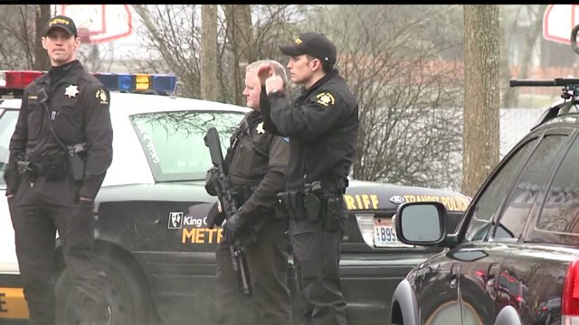 Report of man with gun forces closure of schools
