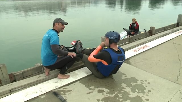 Chip gets strapped into the flyboard gear