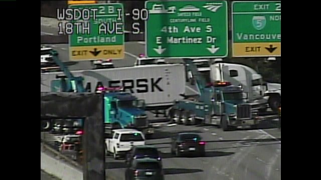 RAW VIDEO: Crews right overturned semi on I-90 in Seattle
