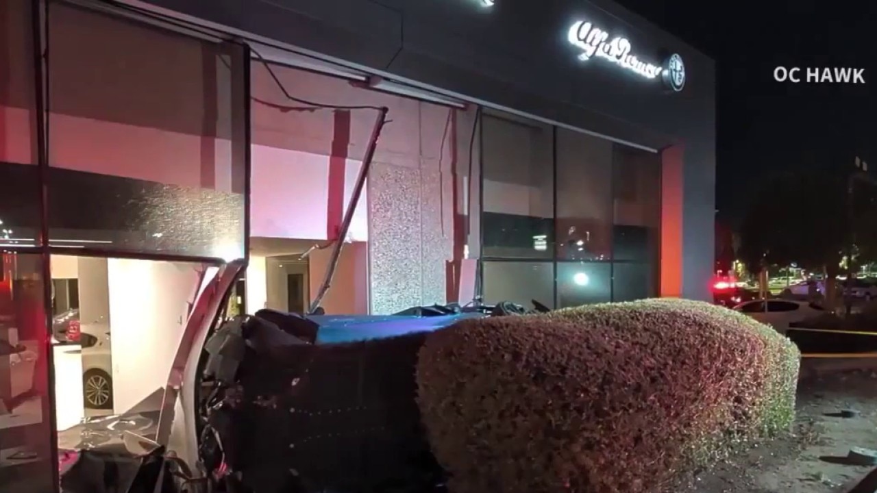 Car crashes into Maserati dealership