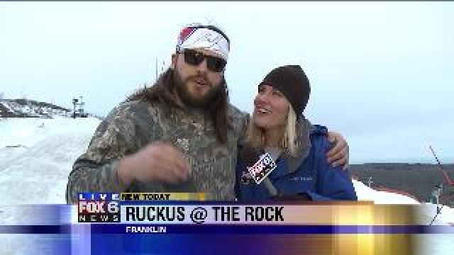 Laura learns about sled building event at The Rock