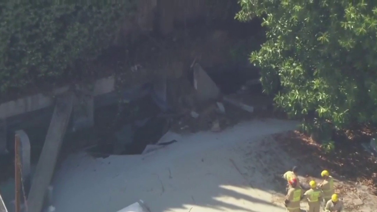 Overflowing pool triggers hillside collapse