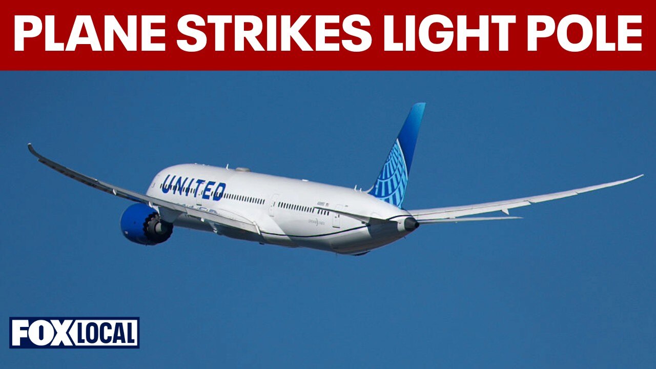 United flight strikes light pole while landing at Newark Airport