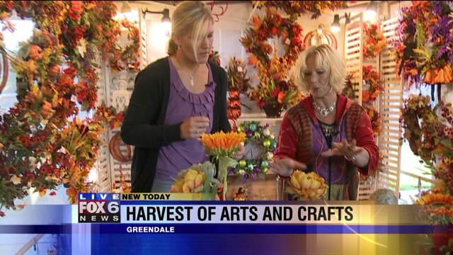 Laura learns how to make centerpiece as she previews Harvest of Arts and Crafts