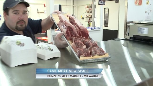 Kramp checks out the meat display case at Bunzel`s Meat Market