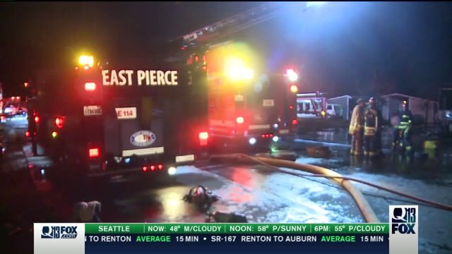 Fire damages custom garage; RV and vehicles destroyed