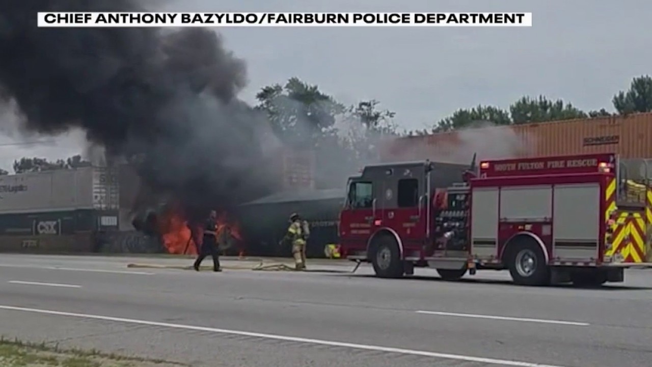 Fairburn train crash ignites tractor trailer fire