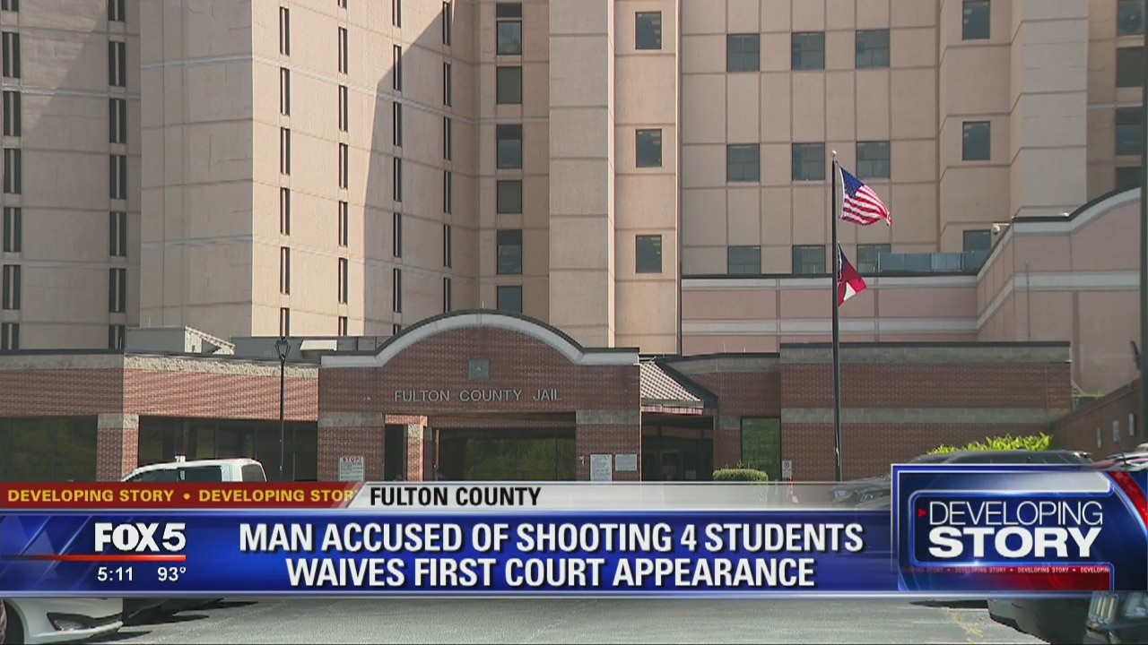 Man accused of shooting 4 students waives first court appearance