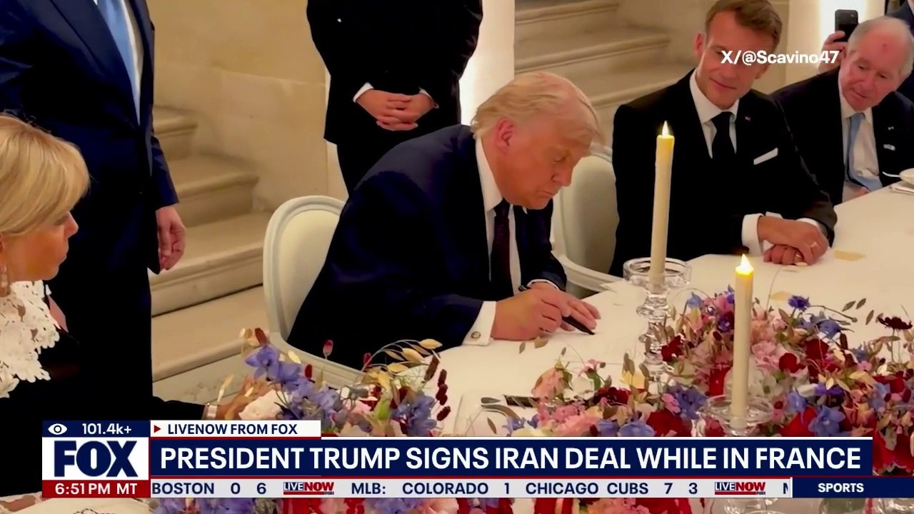 President Trump signs U.S.-Iran agreement while in France