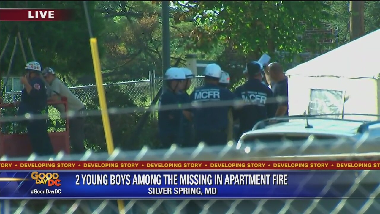 Searchers return to deadly apartment fire scene