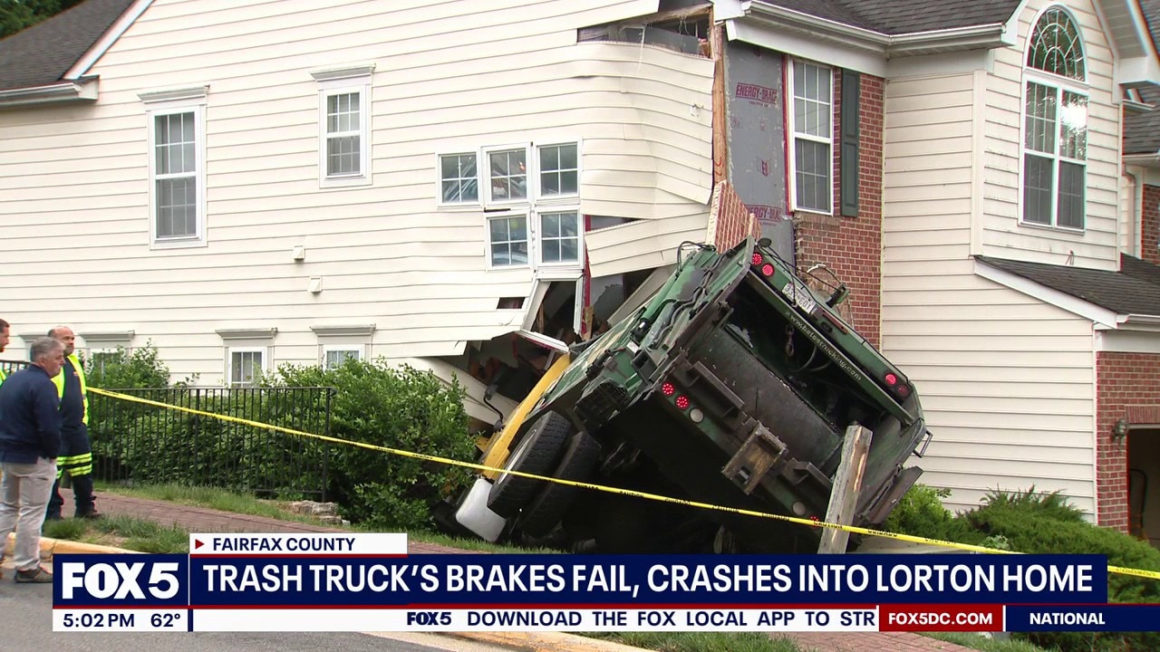 Trash truck crashes into Lorton home