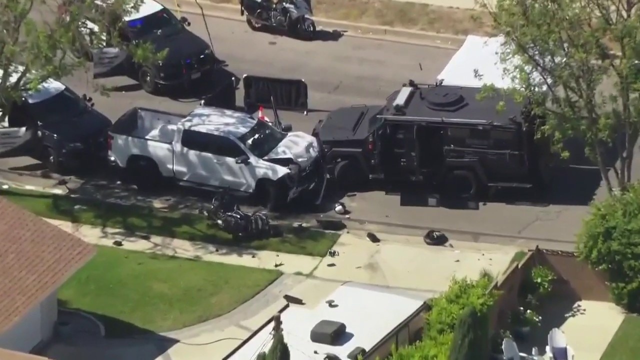 Crash involving pickup truck, police motorcycle