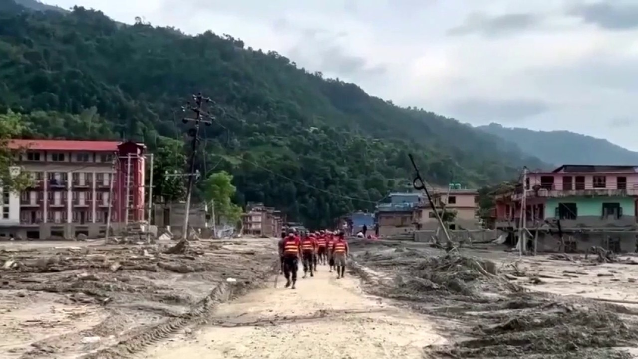 A local rescue team stands by to help in Nepal