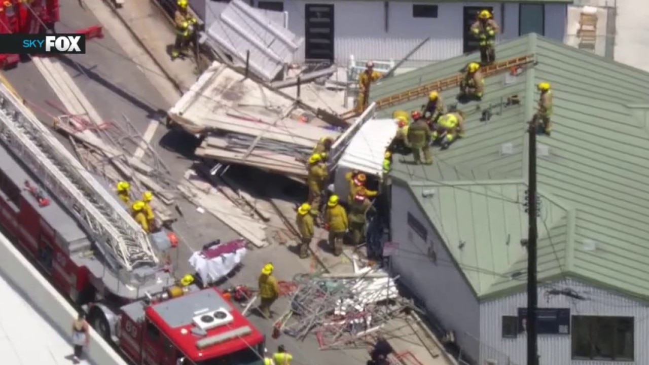 Truck driver rescued after crashing into building on PCH