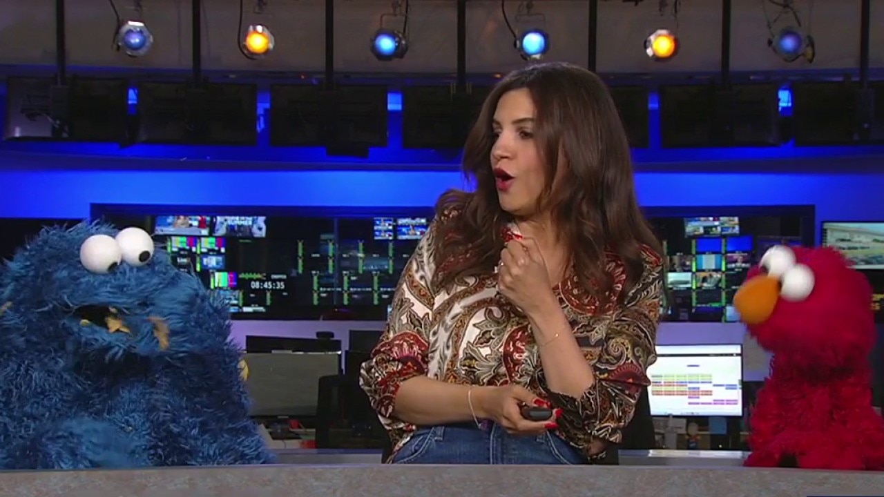 Elmo & Cookie Monster are excited for the World Cup