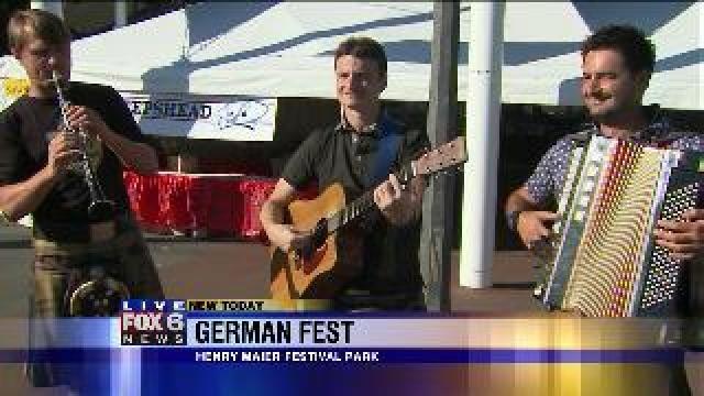 Justin enjoys a performance at German Fest