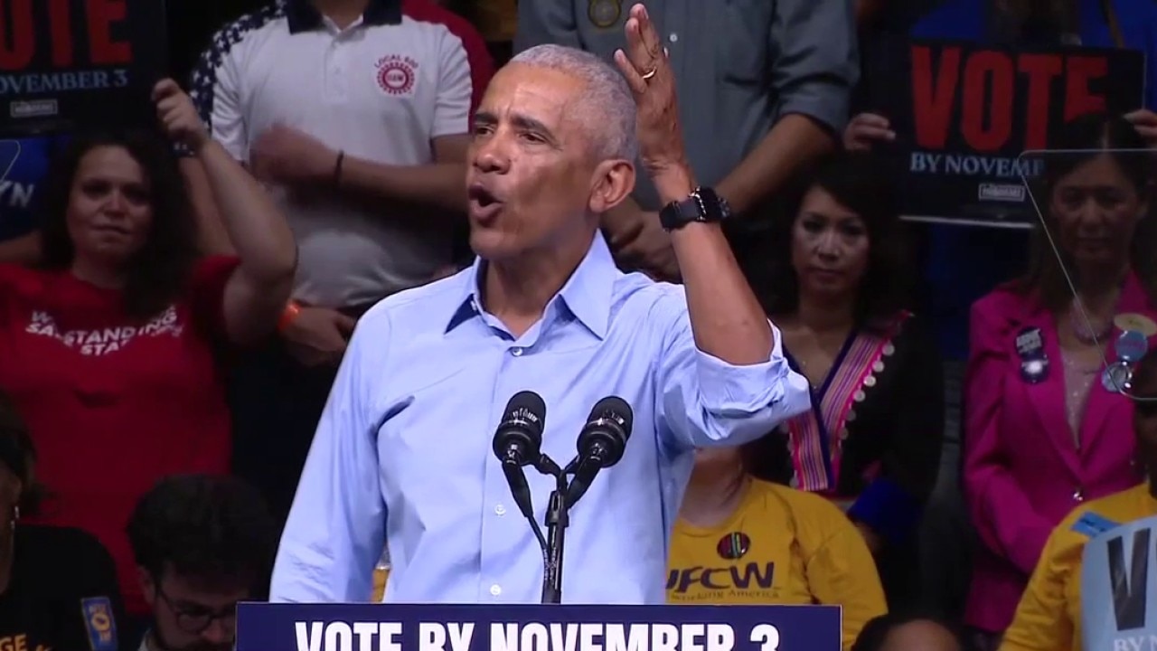 Obama campaigns with Michigan Dems as early voting starts