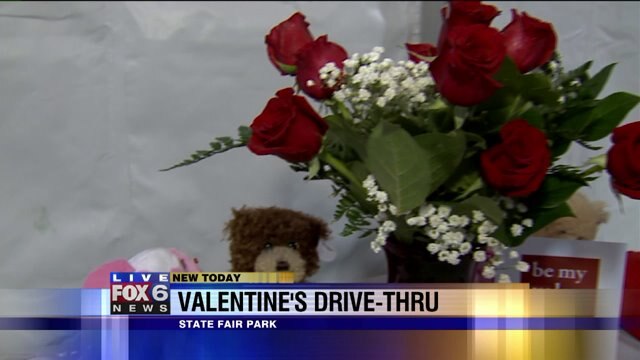 Laura checks out new items at Valentine`s Day Drive-Thru