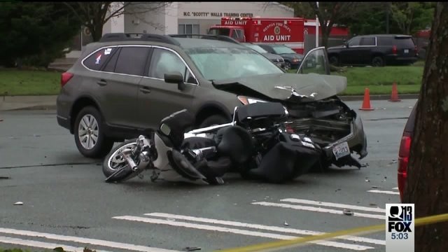 Motorcycle cop hurt in crash with SUV