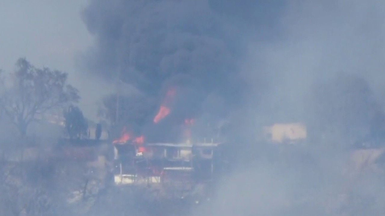 La Habra Heights brush fire burns home 