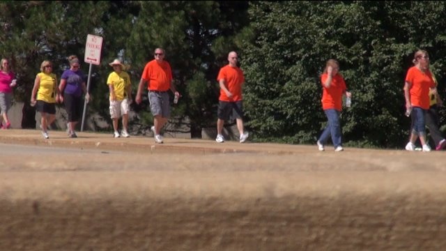 Reaching out to those affected by mental illness: Folks hit the road on two wheels or two feet in NAMI fundraiser