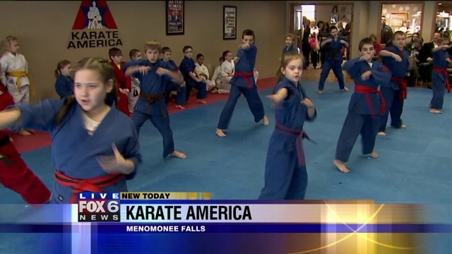 Laura has a blast previewing a class at Karate America
