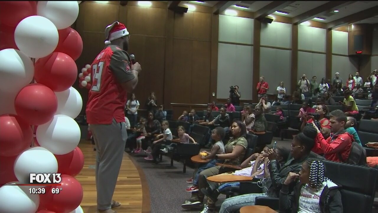 Bucs play Santa for 60 Bay Area families