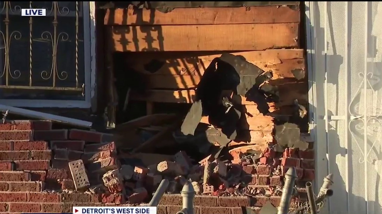 Car slams into house on Detroit's west side