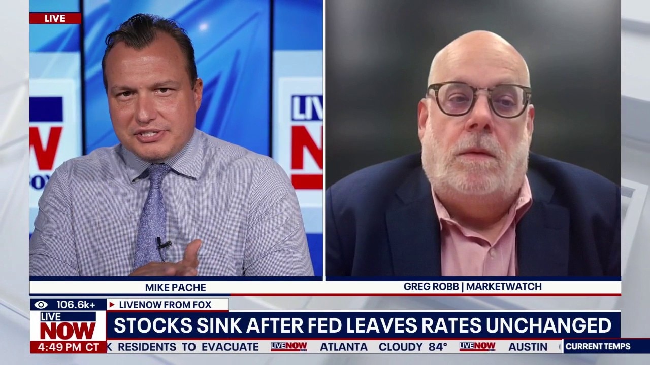 Stocks sink after Fed leaves rates unchanged