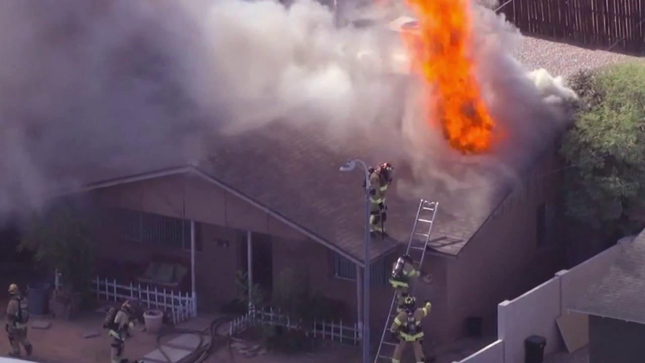Phoenix house fire draws heroic response from neighbors