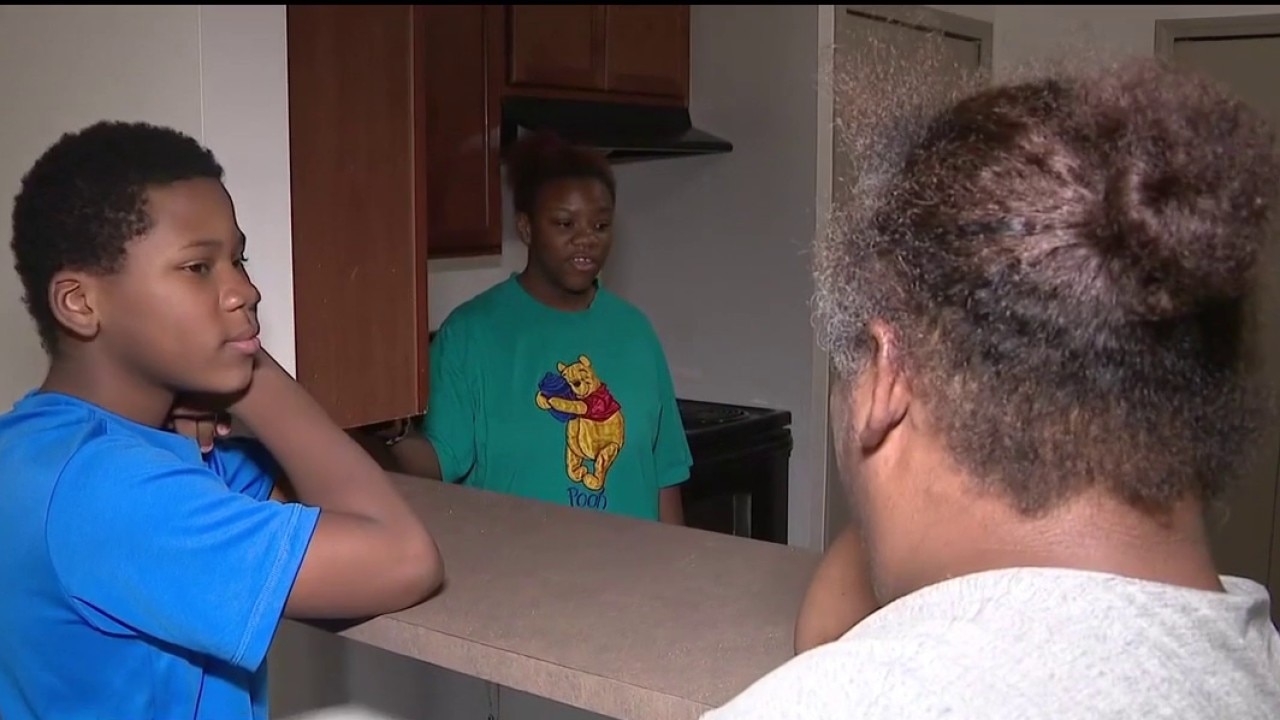 Sweet ending to tough road for Detroit family gifted a home