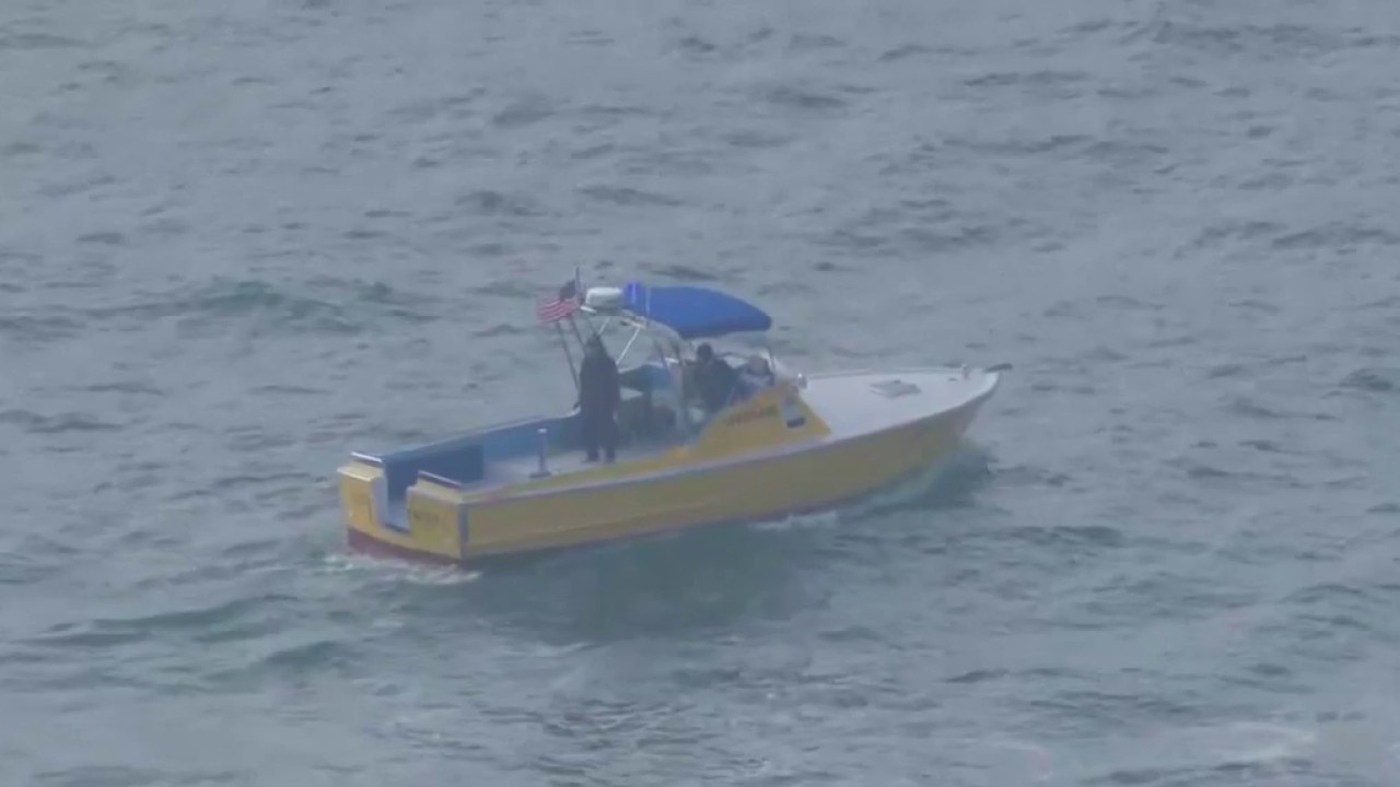 Search underway for girl swept out by big surf in Laguna Beach